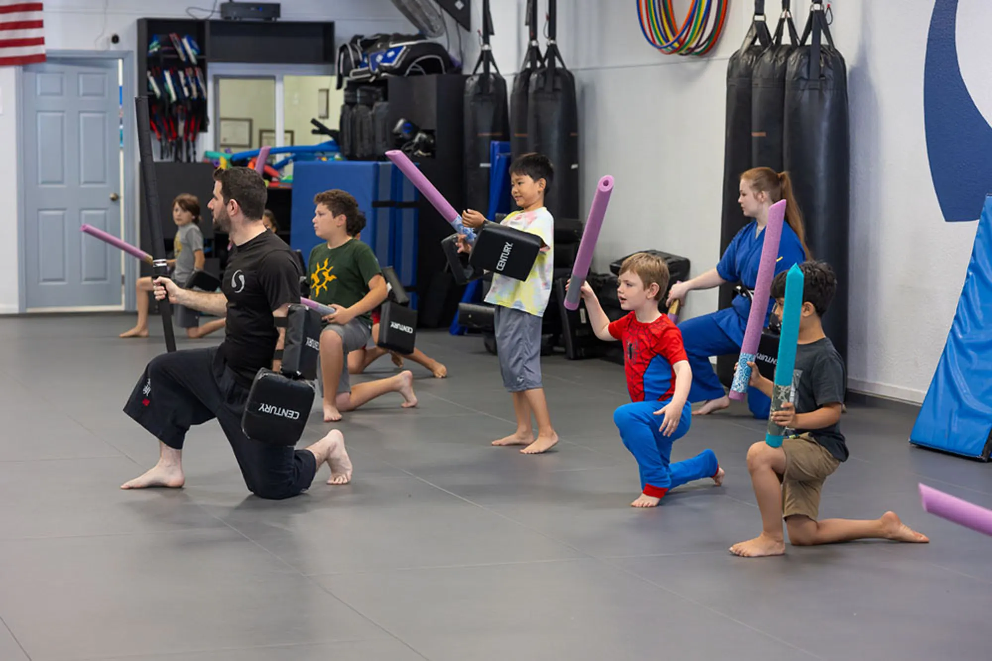 Kids enjoying ninja birthday party activities at SwiftKick Martial Arts