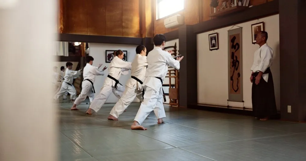 Karate students practicing traditional techniques during martial arts training