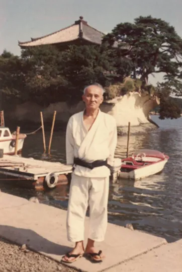 Historical portrait of Hironori Otsuka, founder of Wado-ryu karate, who combined traditional karate techniques with principles of Japanese jujutsu.