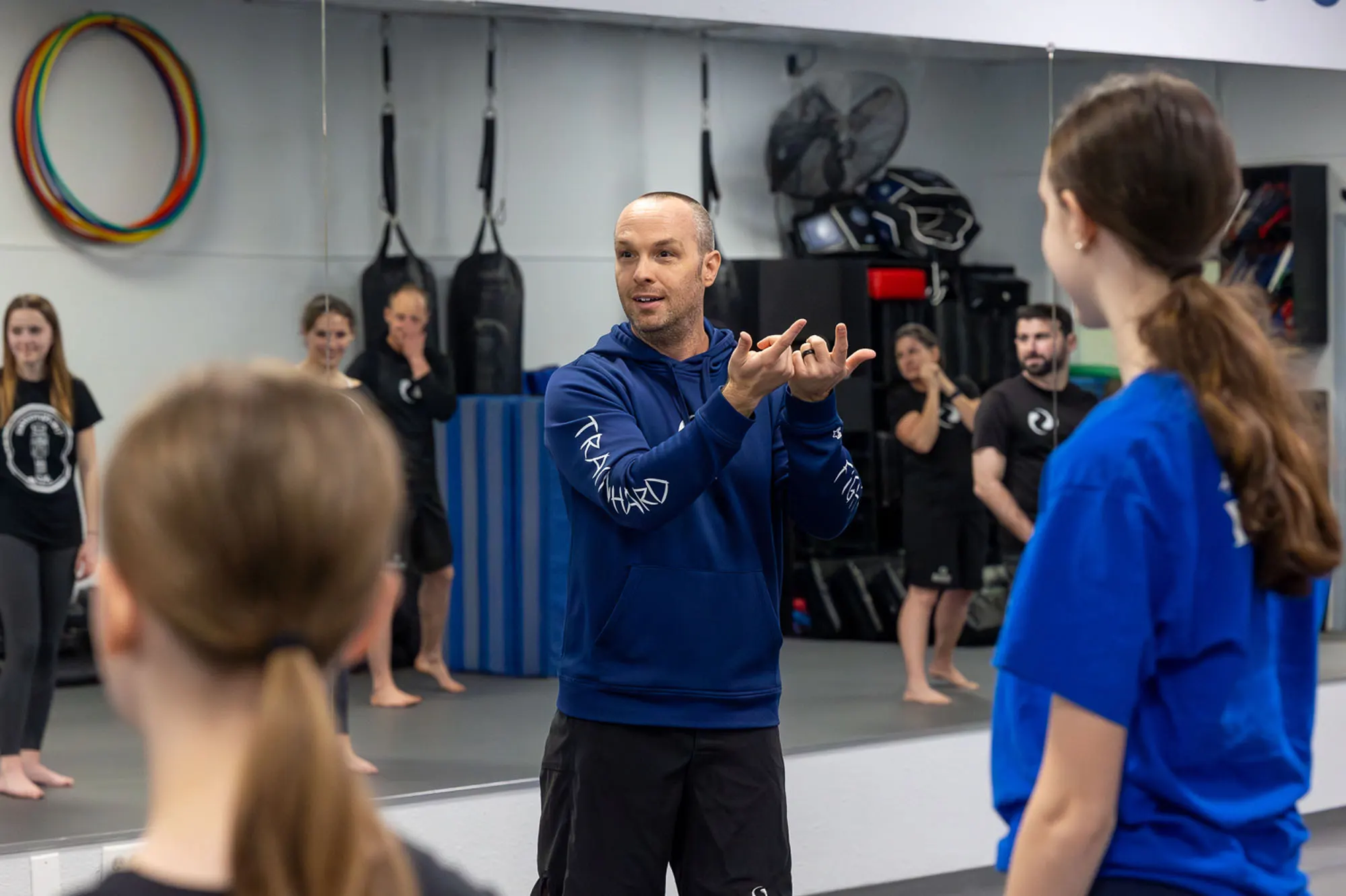 Self-defense training session at SwiftKick Martial Arts in San Diego
