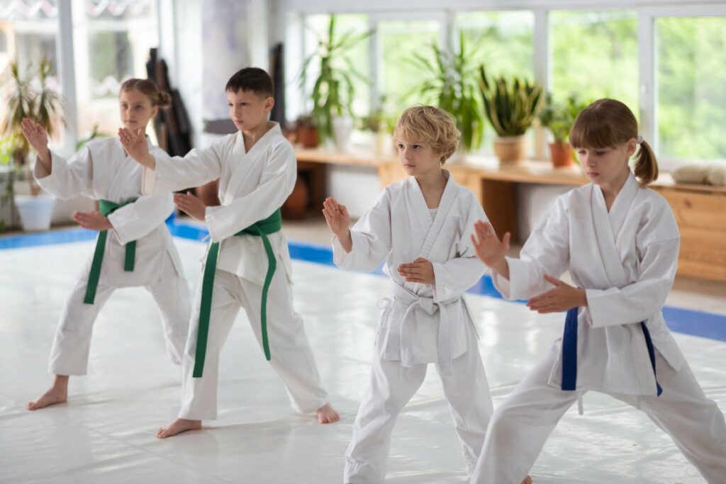 young martial arts students in gis